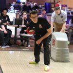 Student participates in bowling