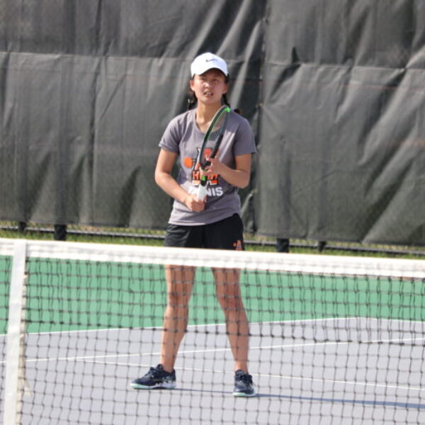 Ames tennis player waits for the serve