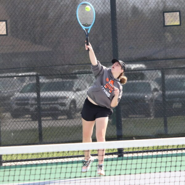 Ames tennis player serves to her opponent