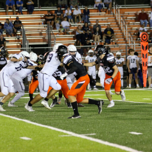 Football players during the homecoming game.