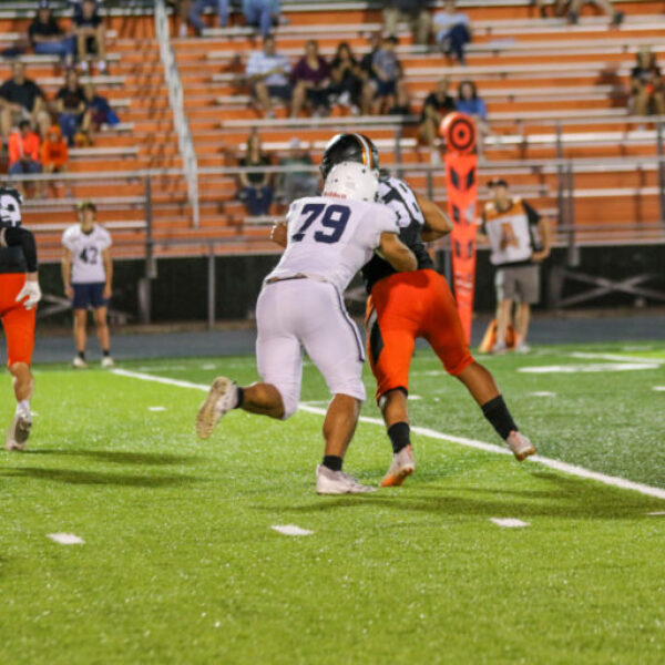 Football players during the homecoming game.