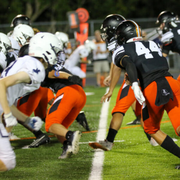 Football players during the homecoming game.