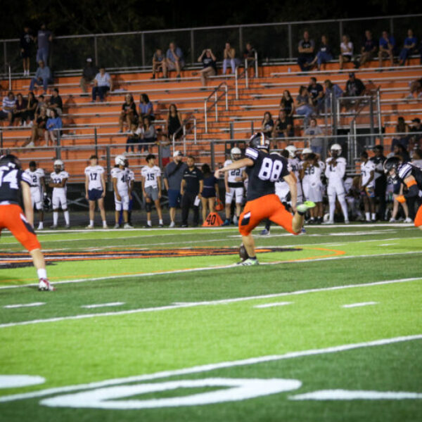 Football players during the homecoming game.