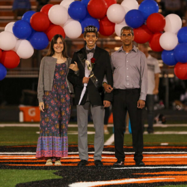 Homecoming king during the football game