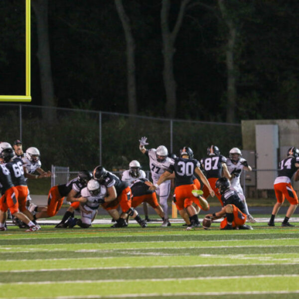 Football players during the homecoming game.