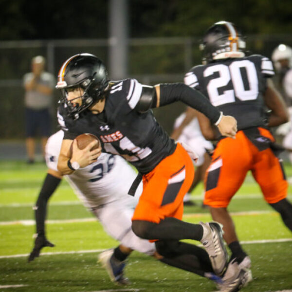 Football players during the homecoming game.