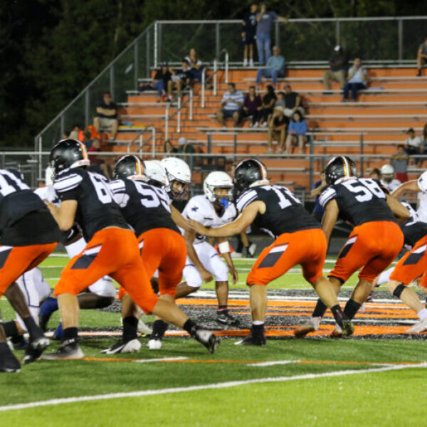 Football players during the homecoming game.