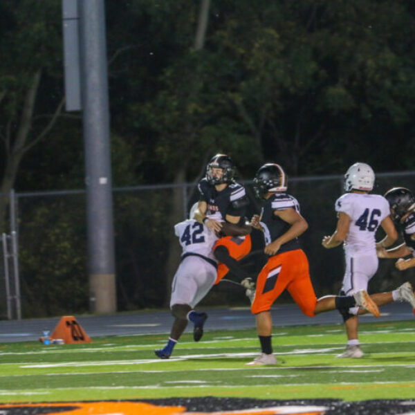 Football players during the homecoming game.