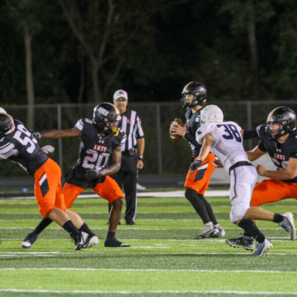 Football players during the homecoming game.