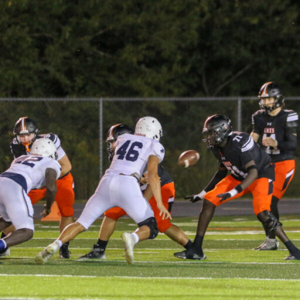 Football players during the homecoming game.