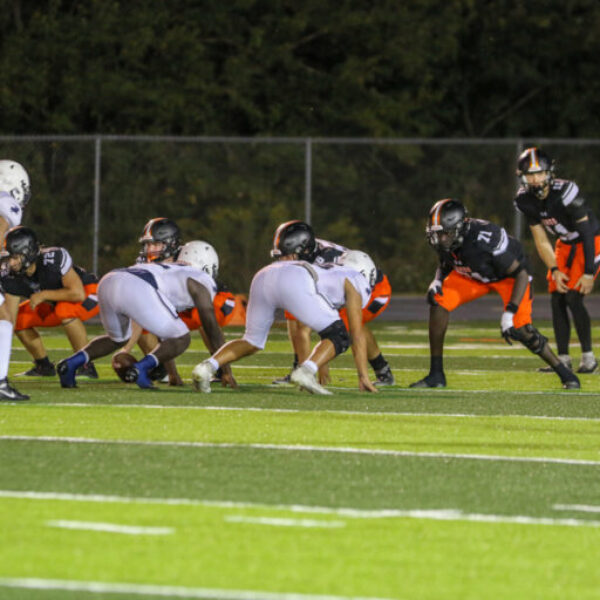 Football players during the homecoming game.