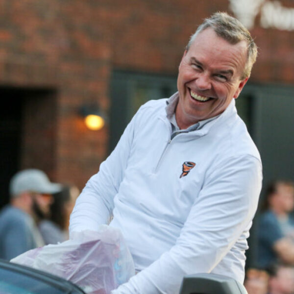 Superintendent Grimes smiling in the parade