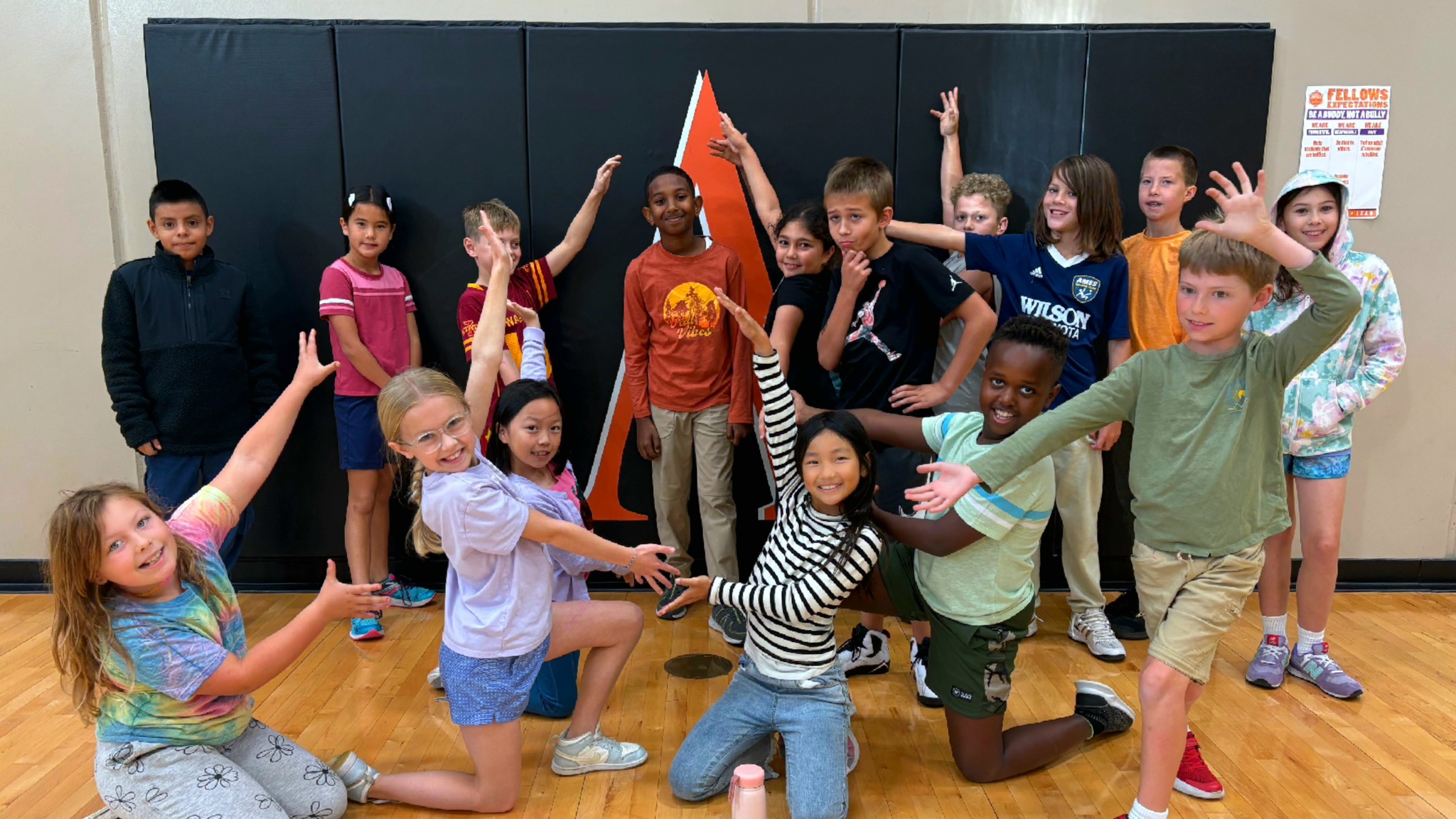 Students celebrating their classmate on becoming an official U.S. citizen